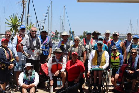 Group posing after sail